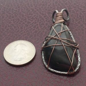 A Copper Wire-Wrapped Stone Pendant